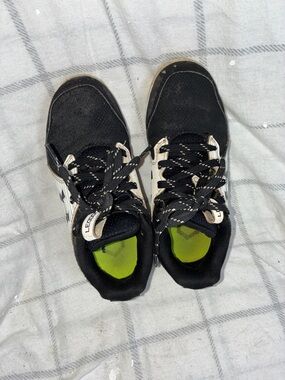 Boys under armour sports cleats size 13 with Neon Green Insole